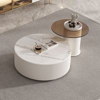 Table basse en roche pour salon avec meuble TV simple, combinaison table basse et meuble TV, table basse ronde en roche couleur crème