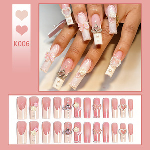 24 faux ongles à presser en ABS, longs et carrés, rose nude, avec spirales métalliques et croix en cristal, style luxueux et glamour pour fêtes et mariages - Product Image 2