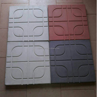 Nouvelle conception 100 Tn Briques à emboîtement hydrauliques Pavé en plastique Machine de moulage de béton