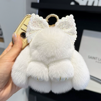 Porte-clés mini lapin en fausse fourrure moelleuse avec longues oreilles, nœud en strass scintillant, porte-clés en fourrure de lapin