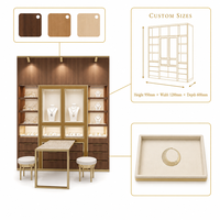 Vitrine à bijoux en marbre blanc sculpté doré, vitrine européenne en aluminium avec verre incurvé et éclairage LED, taille personnalisée pour boutique de détail