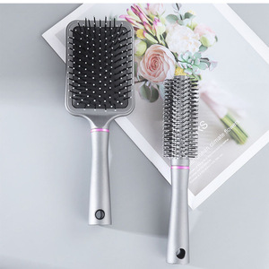 Peigne à cheveux portable personnalisé de 20 cm à dents larges avec <span class=keywords><strong>coussin</strong></span> d'air en PP, outil de coiffure efficace pour les soins capillaires - Product Image 1