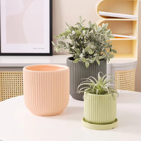Pot de fleurs décoratif moderne pour la maison, en céramique, en forme de tasse à thé, à motif rayé créatif, pour plantes de bureau ou de jardin