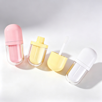 Tube de brillant à lèvres vide en forme de capsule, corps transparent, applicateur Doe Foot, 5 ml, emballage cosmétique, vente en gros, logo personnalisé