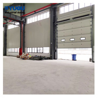 Puertas Seccionales Industriales de Acero Galvanizado con Paneles Sándwich para Exteriores de Almacenes y Fábricas en China