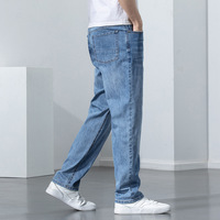 Fabricants de jeans de mode en Chine, vente en gros de jeans pour hommes en coton, polyester et élasthanne, denim bleu moyen classique, coupe ample et droite