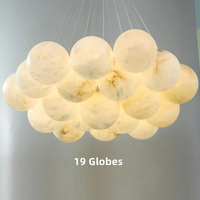 Lustre décoratif d'escalier boule d'albâtre ronde personnalisée éclairage de lustre à LED en marbre naturel