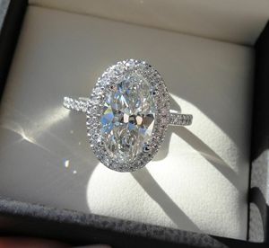 Anello di fidanzamento da donna ovale intarsiato con pietre brillanti, elegante ornamento per le mani per banchetti nuziali - Product Image 6