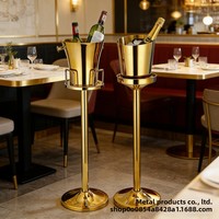 Seau à glace en acier inoxydable de style européen pour bar et KTV, avec support à vin sur pied haut, design nordique minimaliste et créatif sur le thème de l'élanchet