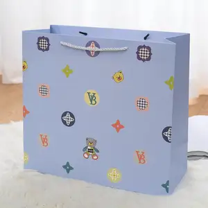Sacchetto di carta Kraft personalizzato in fabbrica 2024 sacchetto di imballaggio Bolsas De Papel regalo Shopping Bag con il tuo Logo personale