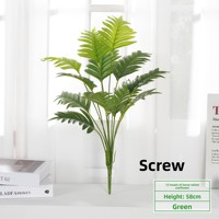 Plante artificielle en pot avec feuilles de simulation, herbe en plastique et feuilles de bananier du voyageur pour décoration intérieure