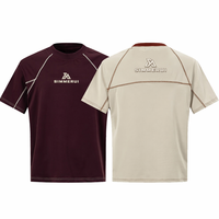 T-shirts personnalisés avec logo, coupe ample, manches raglan courtes, blocs de couleur, surpiqûres contrastées, broderie
