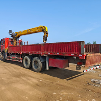Grúa de Camión Usada Confiable de 12 Toneladas con Caja de Carga de 8.5m, Pluma Larga para Transporte de Materiales a Distancias Medias y Cortas