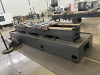 Tour CNC personnalisable de 1,5 m de long pour usinage de rouleaux de convoyeur, avec double mandrin de 95 mm et deux porte-outils à double extrémité