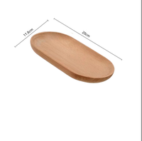 Petite assiette de service ovale en bois d'acacia