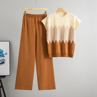 Ensemble coordonné en tricot pour femme, style luxe discret, pull sans manches côtelé et pantalon palazzo, collection boutique été