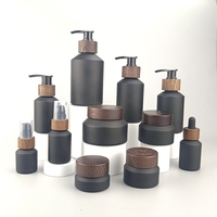 Flacon en verre noir mat à épaule inclinée 15 ml 30 ml 60 ml 100 ml 125 ml 200 ml Flacon cosmétique avec fermeture en bois
