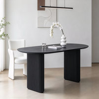 Table à manger noire en gros, écologique, durable, minimaliste, avec base cannelée pour la maison et la restauration