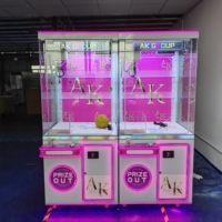 Machine à griffes autonome à fort potentiel de profit, avec motif imprimé intégral et lecteur de cartes personnalisé, pour centres commerciaux et parcs d'attractions