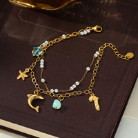 Pulsera de Acero Inoxidable de Doble Capa con Dijes de Delfín y Estrella de Mar, Chapada en Oro PVD de 18K, Resistente al Deslustre, Joyería Impermeable para Viajes a la Playa