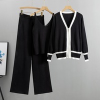 Ensemble 3 pièces tricoté automne-hiver 2026 en gros : Cardigan zippé à bordure contrastante, caraco col en V et pantalon large – Collection Luxe Discret
