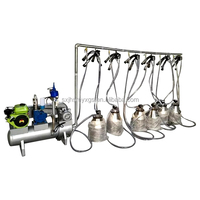 Machine à traire portative de haute qualité de vache avec le composant de moteur de noyau de pompe à vide de seau de quatre seaux