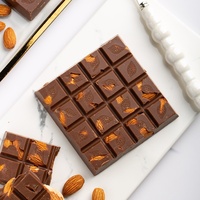Barra de Chocolate Amargo com Avelã e Amêndoa |   Sabor Rico de Café 100% Manteiga de Cacau |   Nozes Inteiras Crocantes 100g/unidade Prazo de Validade de 12 Meses