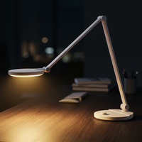 Lampe de bureau LED ABS contemporaine pliable avec bras simple, protection oculaire, éclairage flexible et rotatif à intensité variable pour lecture et bureau
