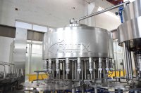 Machine de capsulage de remplissage de rinceur monobloc automatique électrique de 500ml pour boissons et eau avec composants de moteur à noyau