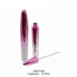 Tube de mascara vide en silicone rose avec bouchon à vis pour l'application de fard à joues et d'eye-liner - Product Image 1