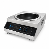 Cuisinière à induction commerciale concave 220V 3.5kW 5kW avec wok de 450mm à double poignée pour cuisson à la poêle