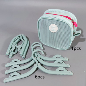Cintre pliable de voyage portable avec sac de rangement pour les voyages d'affaires, les dortoirs étudiants et l'usage domestique - Product Image 1