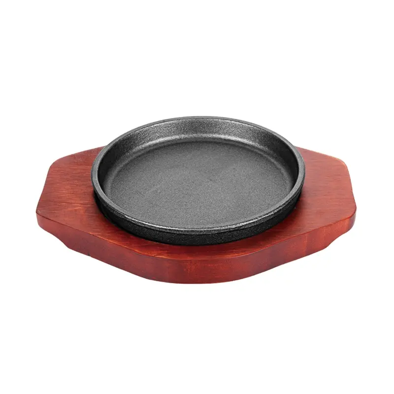 Sıcak satış noel tencere biftek tabağı fajita teppanyaki tava dökme demir yuvarlak cızırtılı plaka kırmızı ahşap taban ile