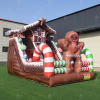 Combo gonflable de Noël avec marionnette et canne à sucre - Château gonflable festif avec toboggan pour location de fête de fin d'année