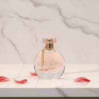 Bouteille de parfum d'épaisseur lourde de 50ml bouteille de parfum en verre ovale transparente de conception spéciale mignonne pour les femmes avec la boîte-cadeau de forme de livre