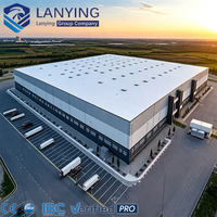 Bâtiment d'entrepôt préfabriqué en acier à faible coût, structure modulaire pour usine industrielle, conception de hangar Q235B pour le stockage