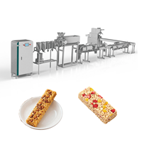 Ligne de production automatique de barres granola, extrudeuse de barres protéinées aux céréales et au chocolat, machine à fabriquer des barres énergétiques aux dattes et au sésame