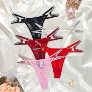 Venta al por mayor de fábrica: <span class=keywords><strong>Tanga</strong></span> sexy de poliamida con cadena de corazón brillante y encaje floral para mujer - Product Image 1