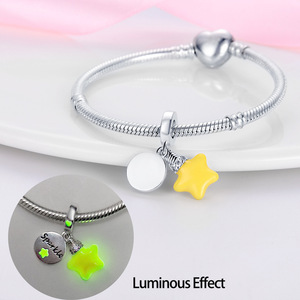 This white brass <b>bracelet</b> features enamel <b>flowers</b> and stars, glows in the dark, and its cute style makes it a perfect gift - Product Image 5