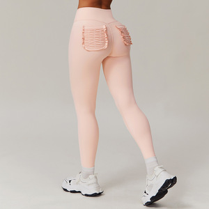 Leggings da donna con elastico a vita alta e con scriccia sul retro e senza cuciture pantaloni in Spandex ad asciugatura rapida con tasche in tinta unita abbigliamento sportivo - Product Image 4
