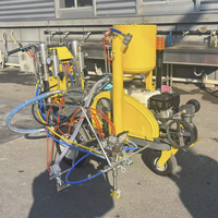Machine de marquage routier à pulvérisation à froid bi-composant avec mélange interne