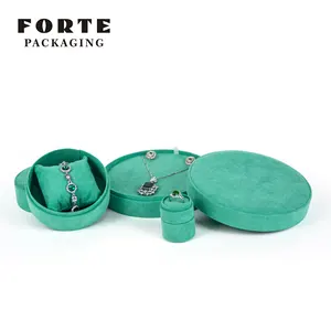 Forte oem לוגו תכשיטים מותאם אישית אריזת יוקרה מיקרופייבר הסיטונאי עגול בצורת תכשיטים לאחסון