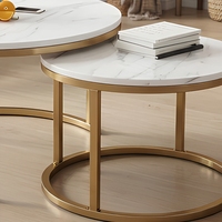 Ensemble de tables basses modernes rondes avec plateau en marbre et structure en MDF pour salon