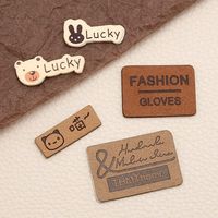 Rouleau de patchs et étiquettes en cuir PU microfibre gaufré personnalisés en gros pour vêtements, sacs, chaussures – Logo personnalisé lavable