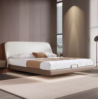 Lit King-size moderne en cuir souple pour hôtel et appartement, avec cadre en bois doré, rembourrage personnalisable et durable, usage commercial