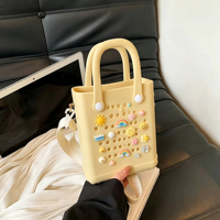 Sac de plage OEM personnalisé toutes saisons en silicone et EVA, étanche, avec deux ouvertures, couleur bonbon tendance, souple, durable, fleurs amovibles