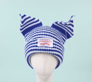 หมวกบีนนี่อะคริลิคทรงโอเวอร์ไซส์แบบออกแบบได้ตามต้องการหูแมวจิ้งจอกถักแบบหนาลายตัวอักษรให้ความอบอุ่นในฤดูหนาวสำหรับผู้ชายผู้หญิงสำหรับการเดินทาง - Product Image 5