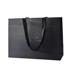 Оптовая продажа, черный бумажный пакет для покупок с индивидуальным принтом логотипа бренда