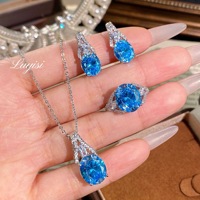 Nouvelle Collection : Parure de Bijoux Fantaisie pour Femme – Collier Pendentif Romantique Paraiba, Boucles d'Oreilles en Laiton Bleu Azur Forme Œuf de Colombe et Bague Ouverte