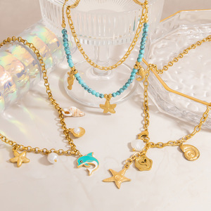 Collar de Varias Capas Serie Océano, Aleación de Zinc, Color Dorado, Cuentas de Turquesa, Dije de Estrella y Delfín, Joyería de Moda - Product Image 1